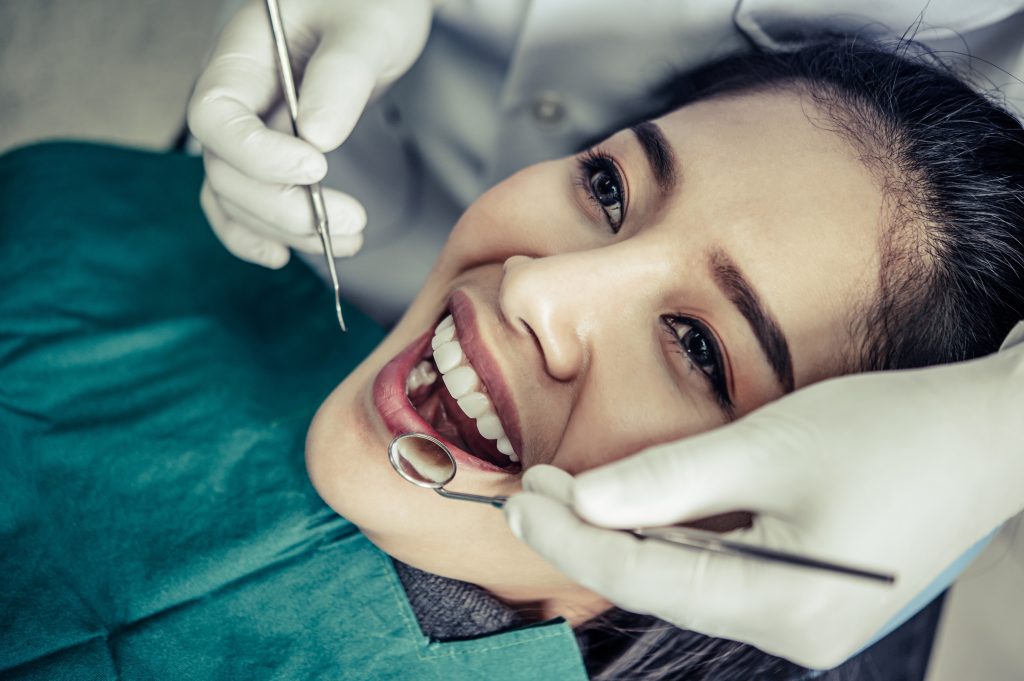 Dentists treat patients' teeth.